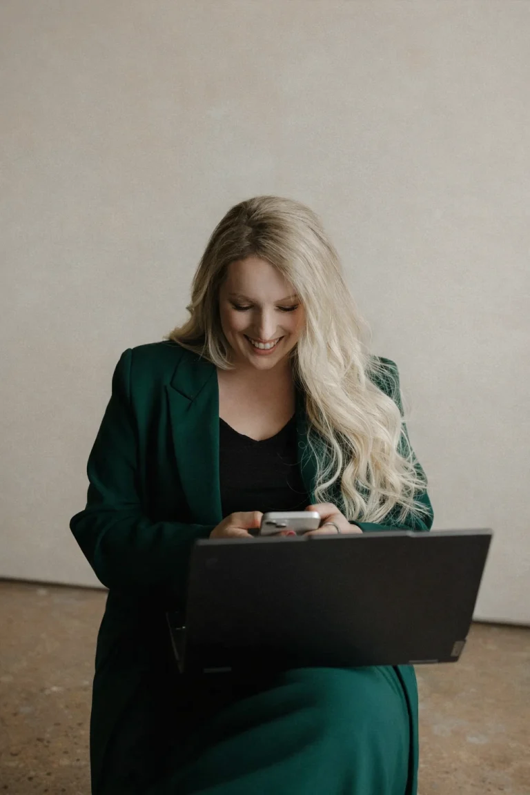Emro Law in wisconsin smiling looking at phone
